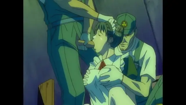 A man in a blue jumpsuit is standing over a woman in a white shirt and red tie who is sitting in a chair, while a construction worker in a hard hat and green shirt stands behind her, holding her head as the man in the jumpsuit performs oral sex on her. Screenshot from Discipline - Episode 5