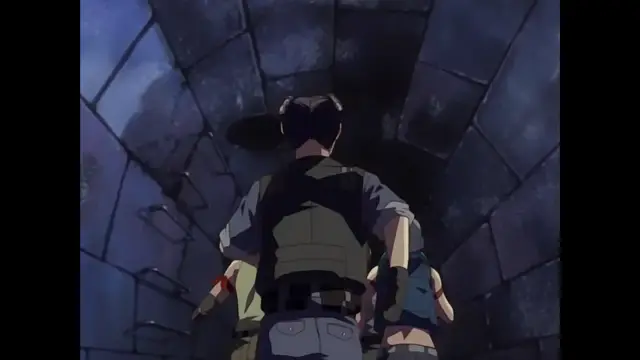 A man with short hair, wearing a brown tactical vest and gray trousers, stands in a dimly lit stone corridor facing two girls in shorts and shirts. Screenshot from Discipline - Episode 6