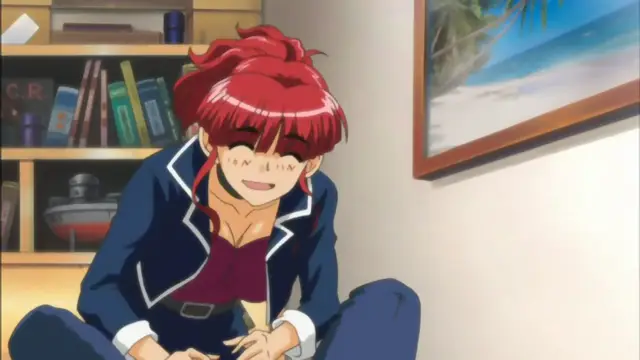 A red-haired anime girl wearing a school uniform sits on the floor with a happy expression, leaning forward with her hands clasped in her lap. Screenshot from Mama Puri!? - Episode 1