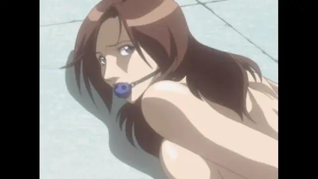 A woman with brown hair and blue eyes lies on a tiled surface wearing a blue headset, appearing to be in a submissive or teasing position. Screenshot from Cambrian - Episode 1