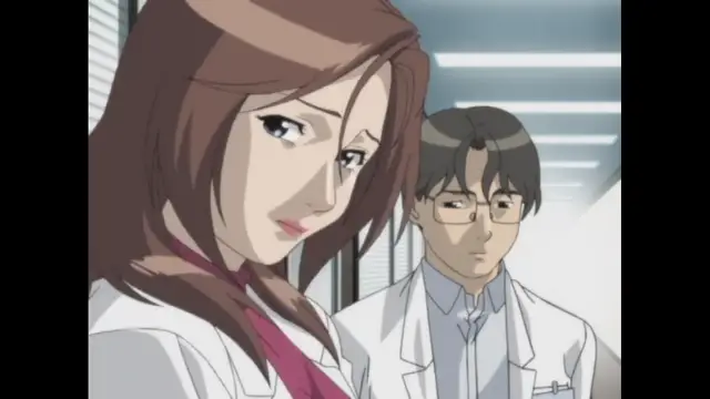 A woman with long brown hair in a white lab coat stands in the foreground with a serious expression, while a man with glasses and a white lab coat stands behind her in a clinic or laboratory setting. Screenshot from Cambrian - Episode 2