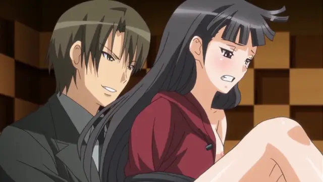 A man with short brown hair and a black suit looks on with a smirk as a long-haired woman in a red top sits with her legs spread and a blushing, wide-eyed expression. Screenshot from Yume Kui: Tsurumiku Shiki Game Seisaku - Episode 2