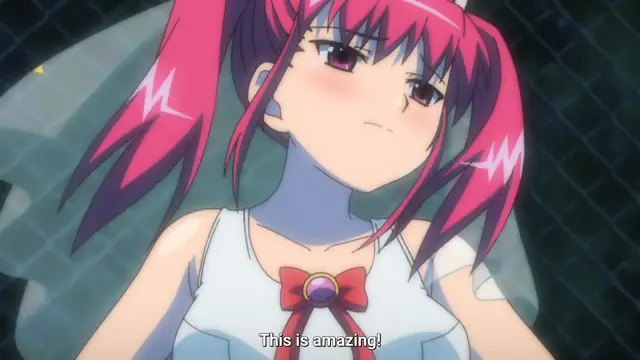 A pink-haired anime girl with pigtails and a white dress with a red bow looks slightly dazed and blushing, with the subtitle "This is amazing!" at the bottom of the frame. Screenshot from Tsundere Inran Shoujo Sukumi - Episode 2