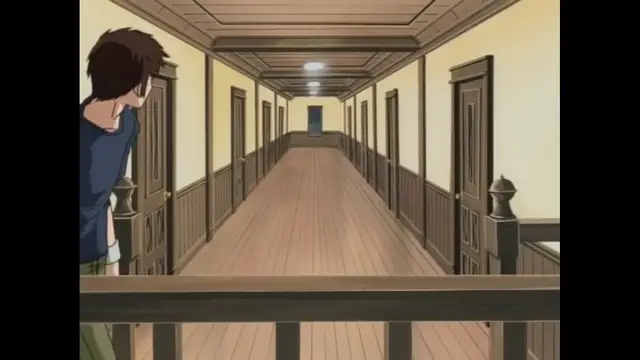 A man looks down a long, empty hallway in a school-like building with wooden floors and multiple closed doors. Screenshot from Black Widow - Episode 1