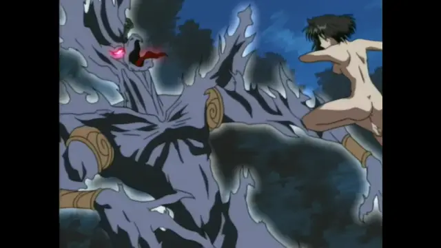 A muscular, naked male anime character with dark hair is shown in a crouching position in front of a giant, multi-armed blue and grey monster with glowing red eyes. Screenshot from Guren - Crimson Lotus - Episode 2