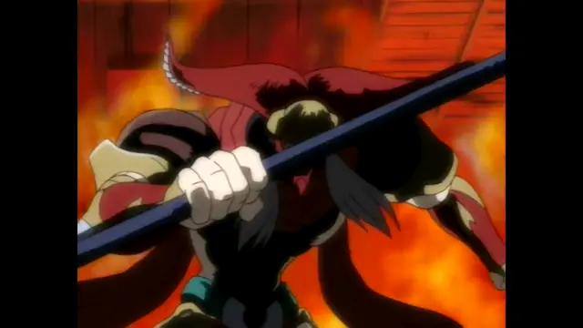 A muscular, red-skinned ogre-like character with long hair and horns wields a large black staff in a fiery, orange-toned battle scene. Screenshot from Guren - Crimson Lotus - Episode 3