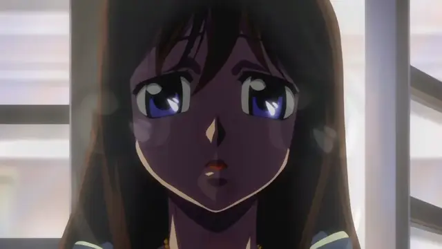 A close-up shot of a brown-haired anime girl with a shocked or dazed expression, her eyes wide and pupils dilated, looking slightly to the side in an indoor setting. Screenshot from Samayou Midara na Lunatics - Episode 1
