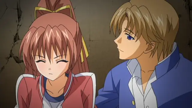 A blushing anime girl with long reddish-brown hair and a school uniform sits next to a blond boy in a blue blazer as they share an intimate moment. Screenshot from Grope: Yami no naka no Kotoritachi - Episode 2