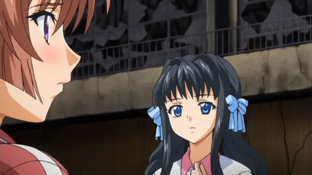 A girl with light brown hair and blushing cheeks looks intently at another girl with long dark hair and blue bows, who appears concerned in a ruined indoor setting. Screenshot from Grope: Yami no naka no Kotoritachi - Episode 2