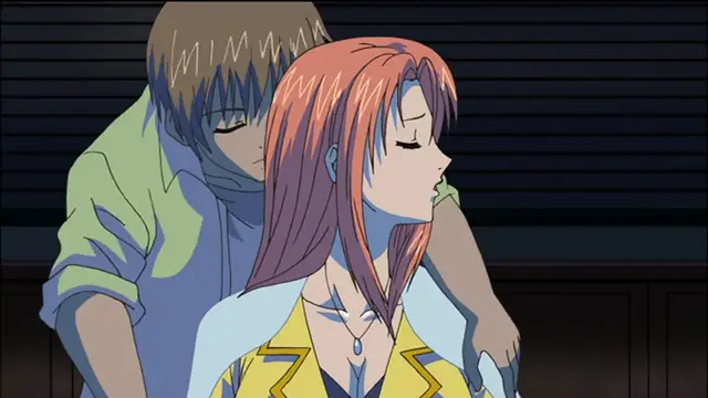 A man with brown hair and blue eyes stands behind a woman with long pink hair, embracing her from behind while they both have their eyes closed. Screenshot from Sailor Fuku Shinryou Tsumaka - Episode 2