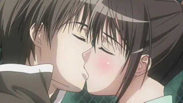 A young man and woman with closed eyes lean in for a passionate kiss. Screenshot from Fault!! - Episode 1