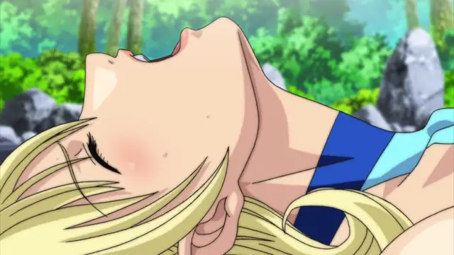 A blonde girl with closed eyes and a flushed face lies back against a green outdoor background while wearing a blue and white bikini top. Screenshot from Discipline Zero - Episode 2