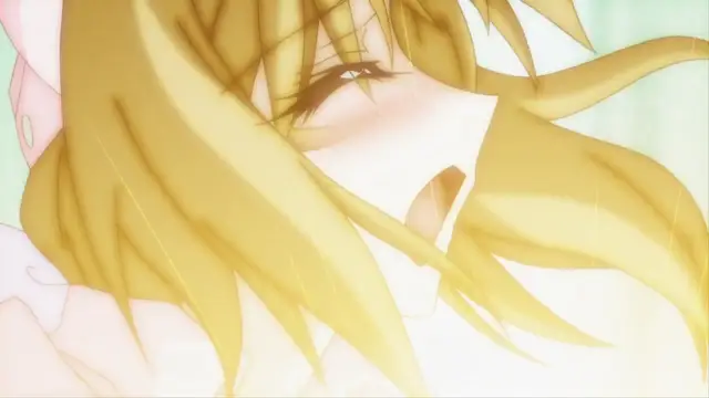 A close-up, high-angle shot shows a blonde-haired anime girl with a blissful expression, eyes closed and mouth slightly open, as she lies on her back. Screenshot from Beat Blades Haruka - Episode 3