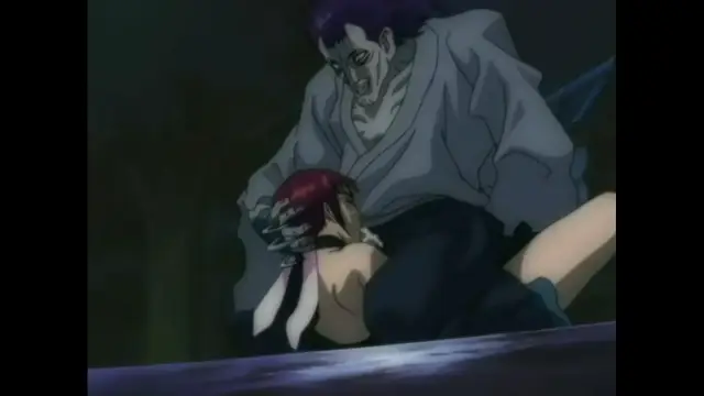 A muscular man with purple hair and a grey robe sits over a woman with red hair, who is lying on her back with her legs spread open on a surface. Screenshot from The Last Kunoichi - Episode 1