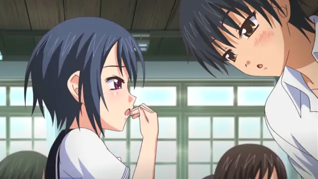 A blue-haired anime girl with blushing cheeks looks up in surprise at a blue-haired boy who is leaning over her and looking into her face in a classroom. Screenshot from Uhou Renka - Episode 1
