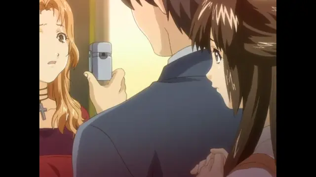 A woman with long blonde hair and a cross necklace stands to the left, looking surprised, while a man in a blue blazer holds a mobile phone in front of a girl with long brown hair who is pressing her face against his back. Screenshot from The Immorals - Episode 1