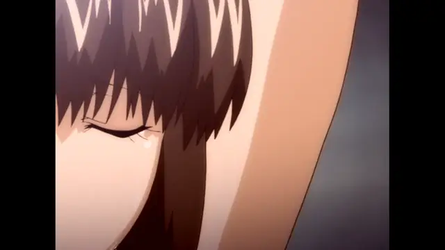 A close-up of a crying anime girl with brown hair and a small tear rolling down her cheek, positioned next to a large, smooth skin-toned surface. Screenshot from The Immorals - Episode 2