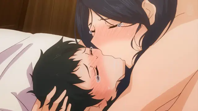 A close-up shot depicts a blushing anime woman with long dark hair leaning over a man with dark hair lying on a bed, both with tears in their eyes as they share an intimate, emotional moment. Screenshot from Inmou - Episode 1