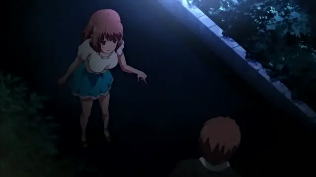 A girl with short brown hair, wearing a white shirt and blue skirt, stands on a sidewalk at night looking shocked, while a boy with orange hair watches her from the shadows. Screenshot from Chiisana Tsubomi no Sono Oku ni - Episode 1