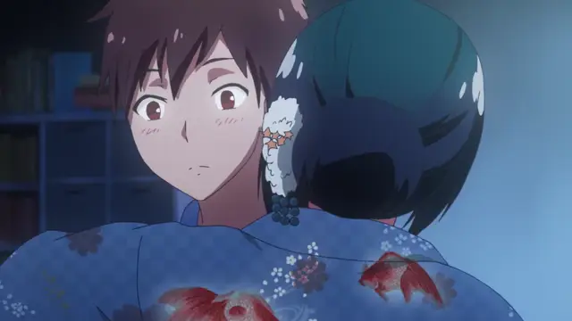 A blushing boy with brown hair and wide eyes looks startled as a girl with long dark hair and a traditional blue floral kimono leans her head against his shoulder from behind. Screenshot from Kimi ga Suki - Episode 1