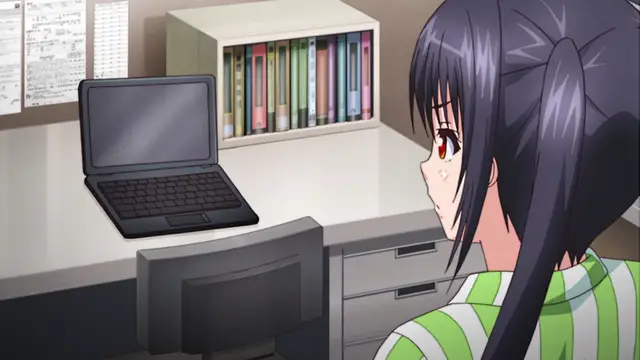 A blushing anime girl with dark hair in a ponytail stares at a laptop on a desk in an office setting. Screenshot from JK to Ero Konbini Tenchou - Episode 3