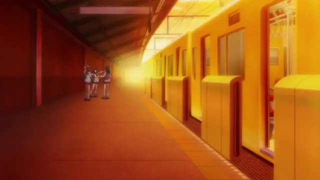 Three girls in school uniforms stand on a train platform next to a glowing yellow train at a subway station. Screenshot from JK Fuuzoku Gakuensai - Episode 2