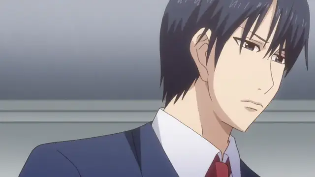 A handsome man with black hair and serious eyes wearing a blue suit and a red tie looks slightly to the side with a neutral expression. Screenshot from Eternity: Shin`ya no Nurekoi Channel - Episode 5