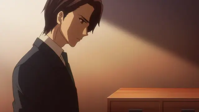 A serious-looking man with brown hair dressed in a black suit and green tie stands in a dimly lit room looking down at a wooden dresser. Screenshot from Eternity: Shin`ya no Nurekoi Channel - Episode 6