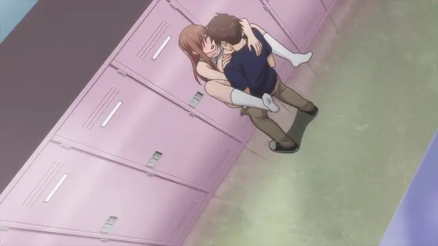 A high-angle shot shows a girl with long brown hair in a school uniform clinging to a boy with short brown hair, who is leaning against a row of pink lockers in a school hallway. Screenshot from Overflow - Episode 5