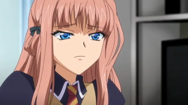 A close-up shot of a pink-haired anime girl with blue eyes and a serious expression, wearing a school uniform with a gold and red tie. Screenshot from Otome Chibaku Yuugi - Episode 2