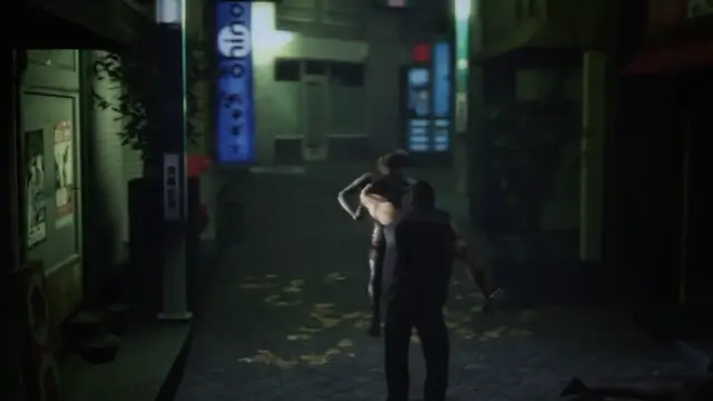 A man stands in a dark alleyway holding a woman over his shoulder as they walk past lit storefronts and scattered leaves. Screenshot from Kunoichi: Broken Princess