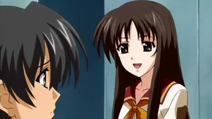 A long-haired girl in a school uniform smiles at a shocked boy with dark hair in a hallway. Screenshot from Futari no Aniyome - Episode 2