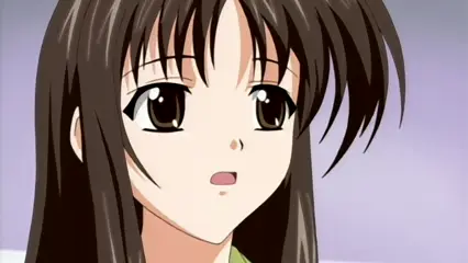 A close-up shot shows a brown-haired anime girl with large brown eyes and a surprised expression looking towards the viewer. Screenshot from Futari no Aniyome - Episode 2