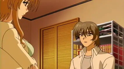 A woman with long light brown hair and a light green top stands next to a man with brown hair in a white shirt inside a room with a wooden door and a shelf of clothes. Screenshot from Futari no Aniyome - Episode 1