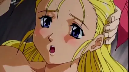 A blonde anime girl with a shocked expression and blushing face is being grabbed by the head from behind. Screenshot from Hinadori no Saezuri - Episode 1